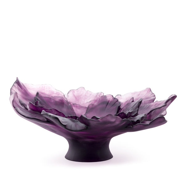 Purple glass bowl with a floral design on a white background