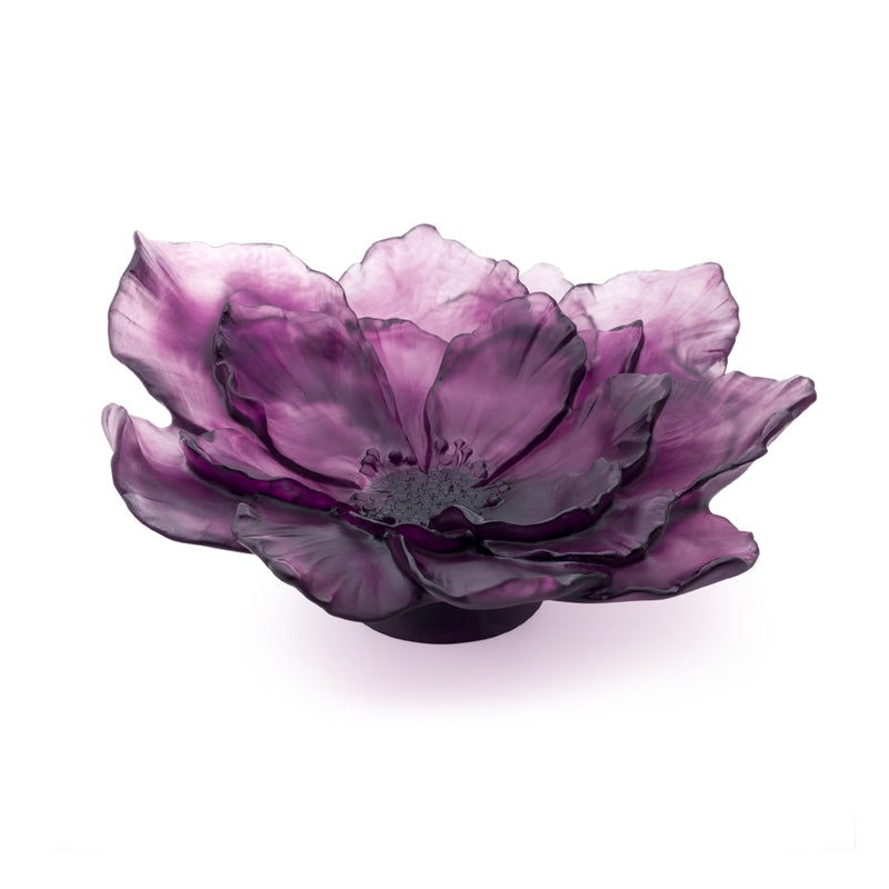 Purple glass bowl with a floral design side view on a white background