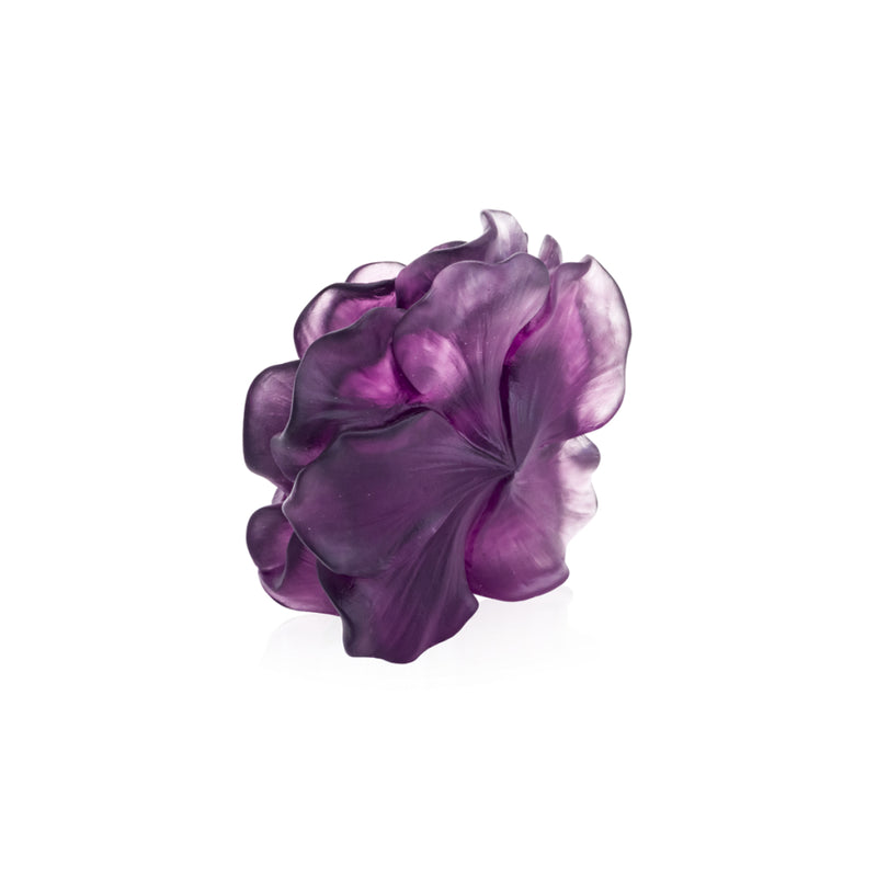 A violet-colored crystal decorative flower sculpture showing the back of the flower