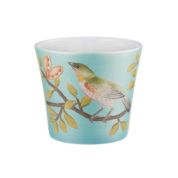 candle with a turquoise colour scheme and bird  design part of the Paradis collection by Raynaud