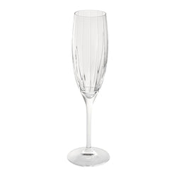 A clear crystal champagne flute with Saint-Rémi crystal champagne flute with fine bevel cuts by Cristallerie de Montbronn displayed against a white background.