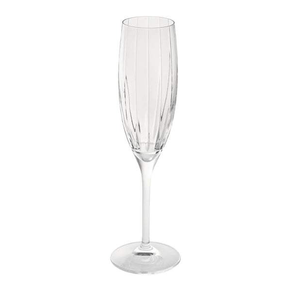 A clear crystal champagne flute with Saint-Rémi crystal champagne flute with fine bevel cuts by Cristallerie de Montbronn displayed against a white background.