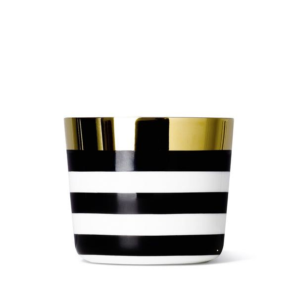Luxury champagne goblet cross stripes design featuring bold black and white bands and shimmering gold lining from ca d oro sieger furstenberg