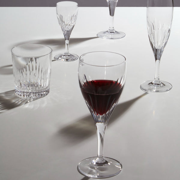 Styled Chartres crystal red wine glass with beveled cuts inspired by Gothic architecture, by Cristallerie de Montbronn.