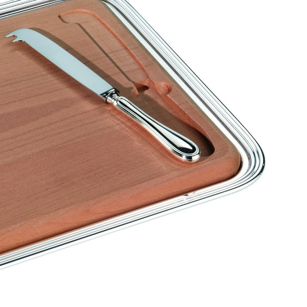 Close-up Wooden cutting board with a silver knife on a white background