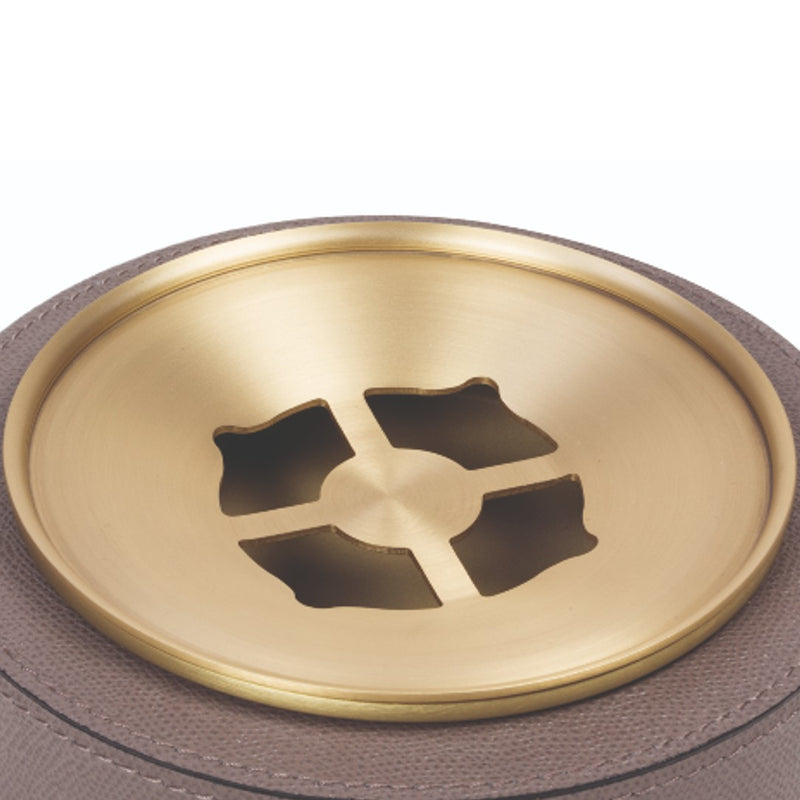 Close-up of the Clan Ashtray in Leather by Giobagnara with removable brass insert.