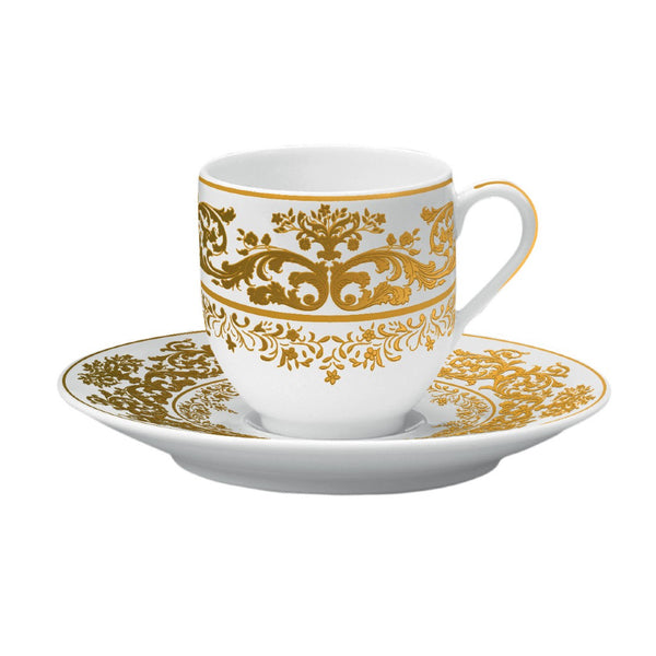 A white porcelain coffee cup with gold floral patterns and a matching saucer.