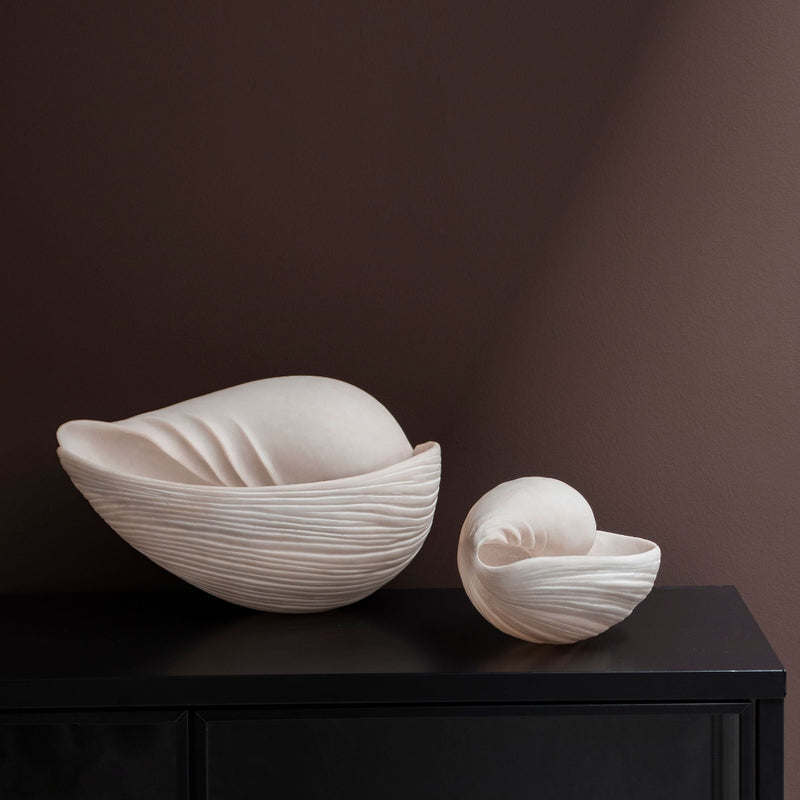 Large and small off-white faux conch shell decor for coastal luxury interiors horizontal 