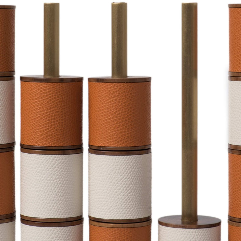 Close-up of Luxury Connect Four game set in mango and white grained leather with satin brass bars by Pinetti