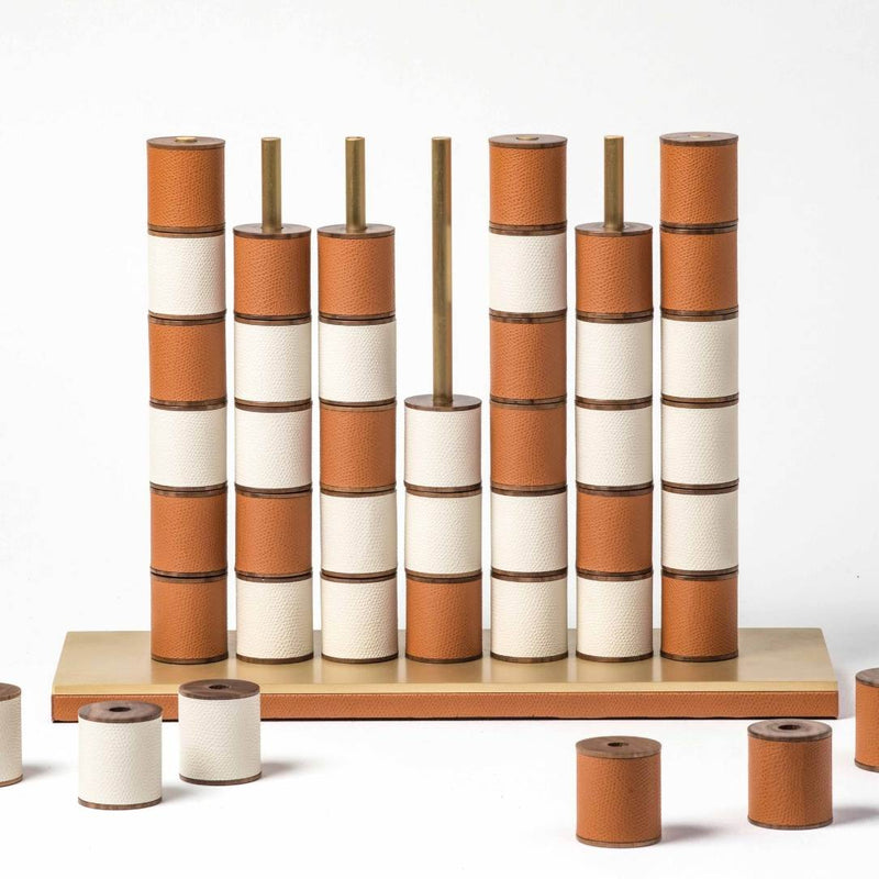 Styled Luxury Connect Four game set in mango and white grained leather with satin brass bars by Pinetti