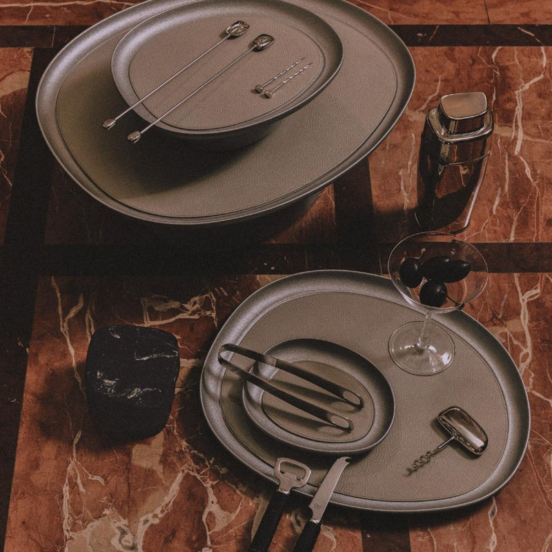 Styled trays with Corkscrew Maris in stainless steel by Kelly Wearstler x Giobagnara