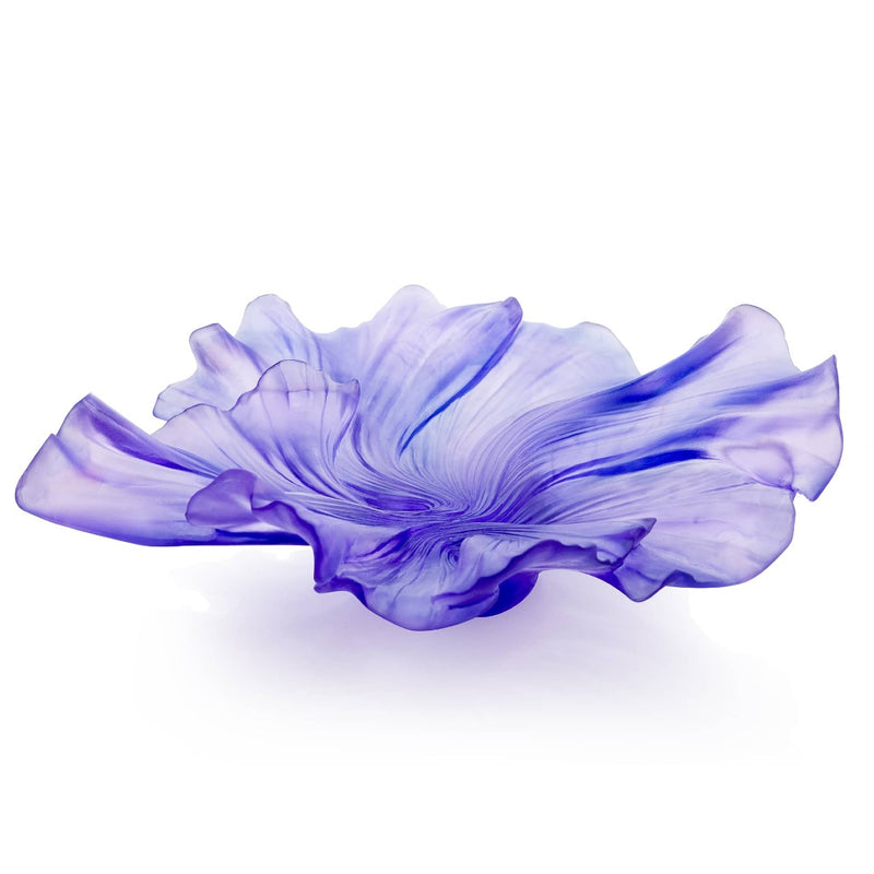 Purple flower-like object on a white background