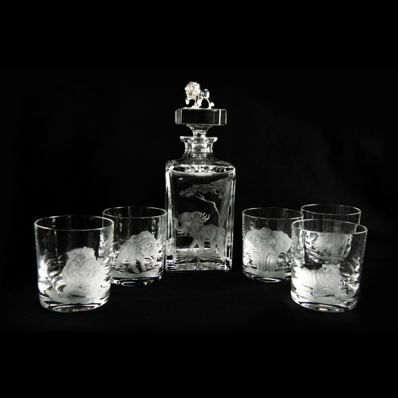Crystal Luxury Engraved Whiskey Decanter Featuring Africa’s Big Five Animals and Silver Lion by Sonja Quandt on a black background