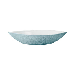 A white and blue porcelain bowl with a mineral iridescent pattern designed by Thierry Cheyrou for Raynaud.