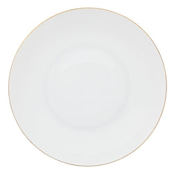 Round white plate with a thin gold rim on a white background