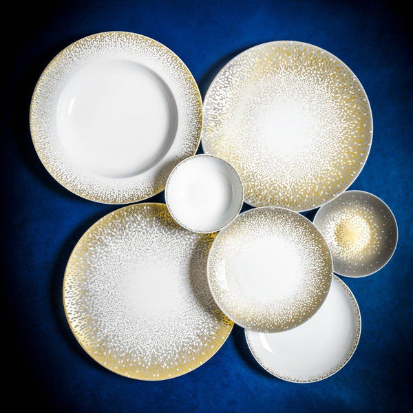 styled Souffle d’Or deep platter by Haviland—Limoges porcelain with silver and matte gold supernova-inspired design.