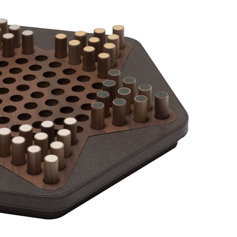 Close-up Delos Chinese Checkers in walnut wood with leather inserts by Giobagnara