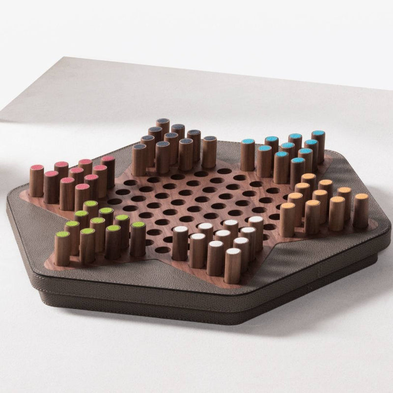 side view of the Delos Chinese Checkers in walnut wood with leather inserts by Giobagnara