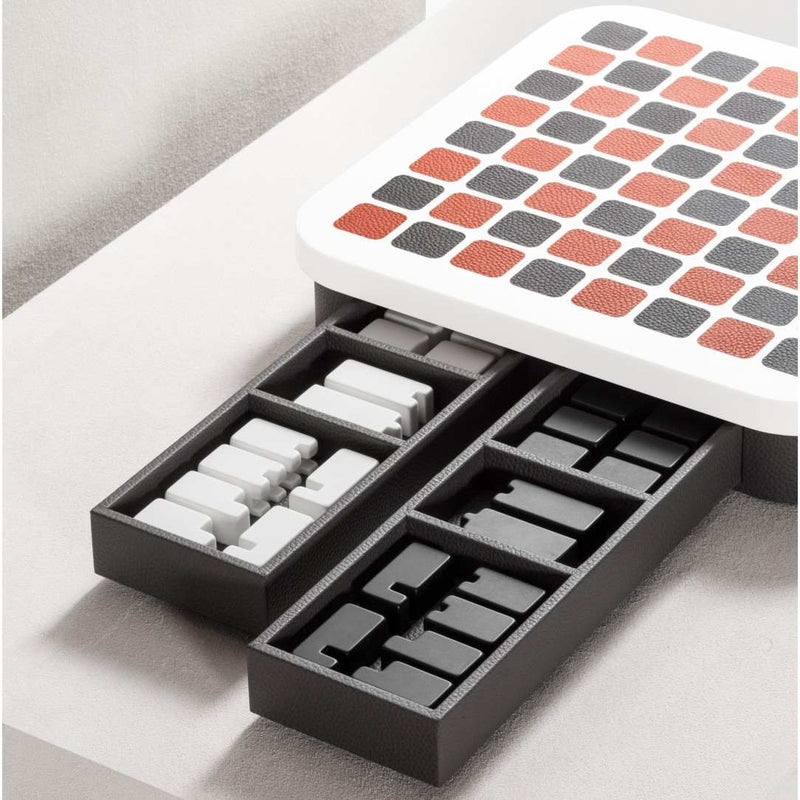 opened drawers featuring Delos Corian chess set in black and white with leather inlays by Giobagnara