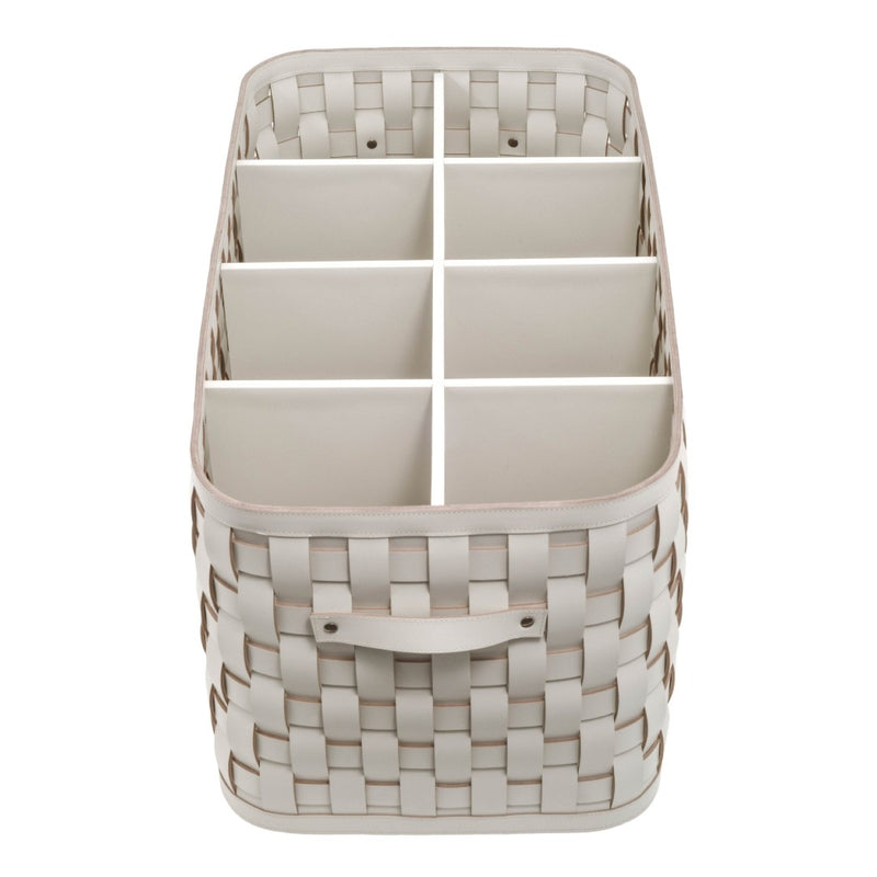 Woven storage basket with compartments on a white background
