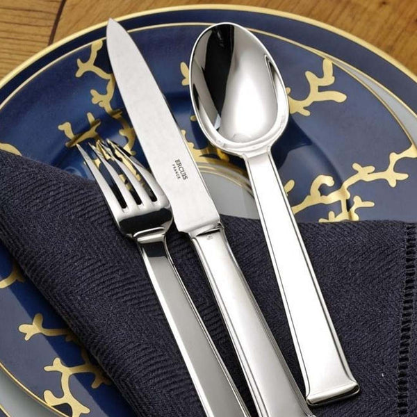 Silver cutlery set on a Dessert Plate Flat Rim No.1 Cristobal Marine porcelain by Raynaud with gold coral on deep blue border