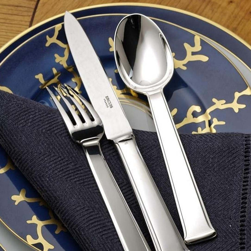 Silver cutlery set on a Dessert Plate Flat Rim No.1 Cristobal Marine porcelain by Raynaud with gold coral on deep blue border