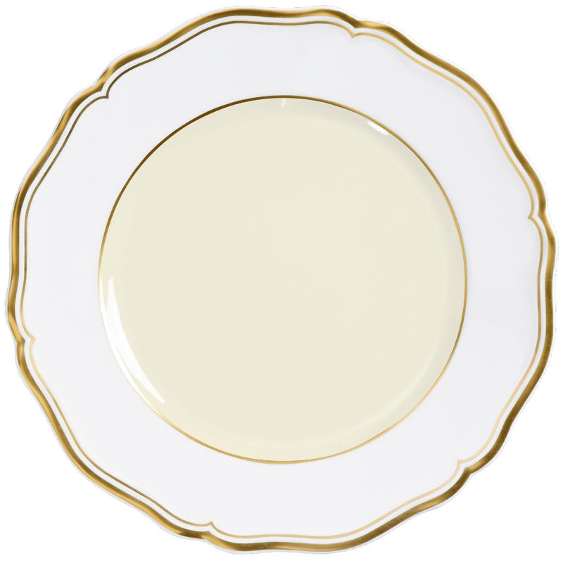 Mazurka, A round, white porcelain dessert plate with gold rim and festoons, displayed against a white background.