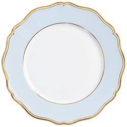 A round, blue grey porcelain dinner plate with gold accents and a scalloped edge.