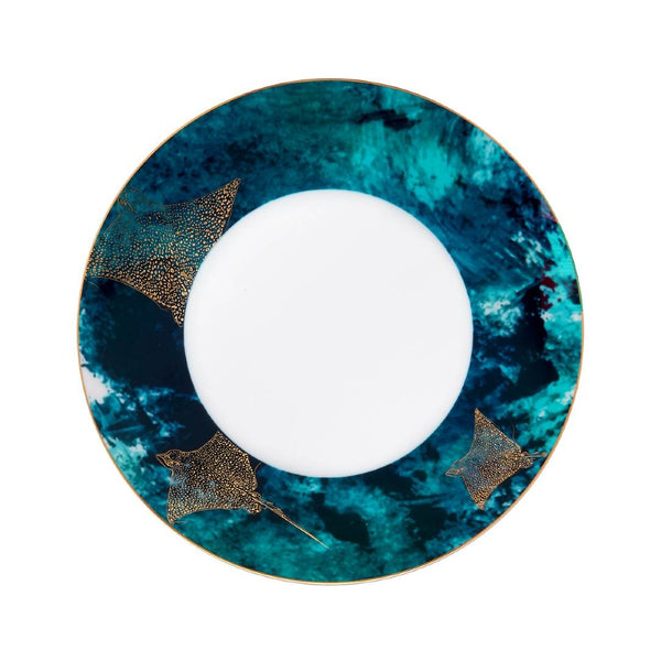 Decorative plate with blue marbled design and gold accents on a white background