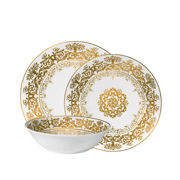 Dinnerware set of 12 pieces Chelsea Gold Fond Blanc by Raynaud, Limoges porcelain with Victorian floral motifs in gold on white, inspired by Gothic tapestries.

