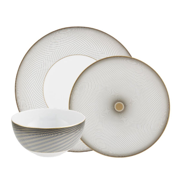 Dinnerware set of 12 pieces in Limoges porcelain with black and gold Bauhaus-inspired motifs from the Oskar collection by Raynaud.