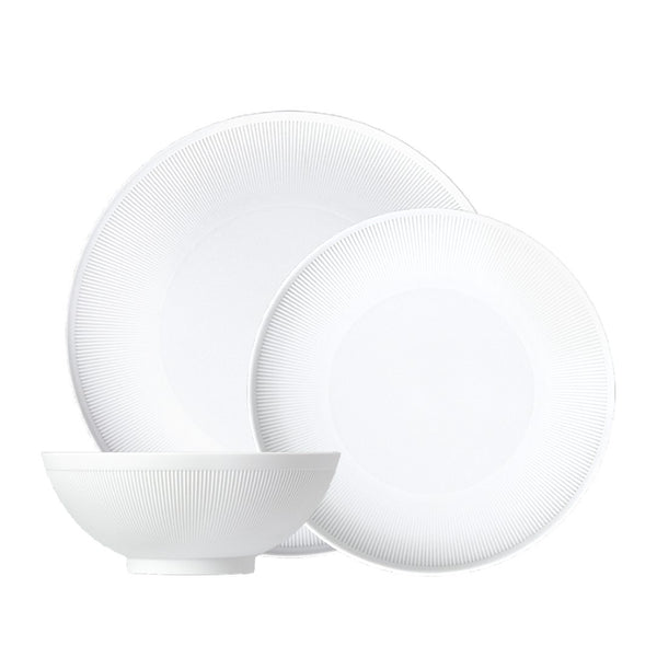 Stella Satin White 12-piece velvety matte porcelain dinnerware set by SIEGER by FÜRSTENBERG, handcrafted in Germany for luxury dining.