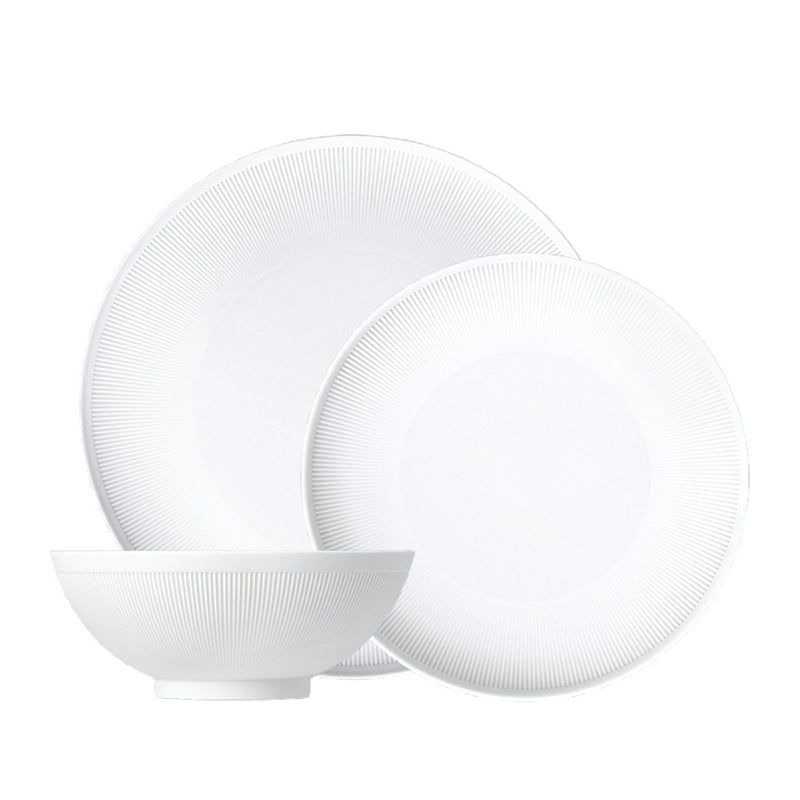 Stella Satin White 12-piece velvety matte porcelain dinnerware set by SIEGER by FÜRSTENBERG, handcrafted in Germany for luxury dining.