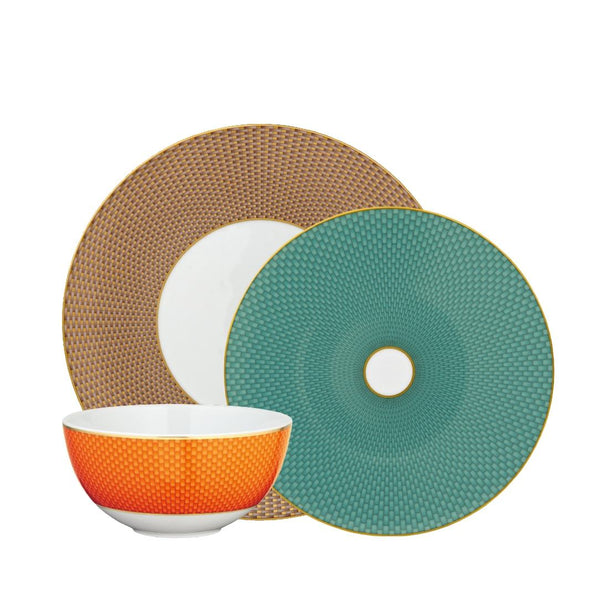 Raynaud Trésor Limoges porcelain 12-piece dinnerware set with sari-inspired honeycomb motif in turquoise, orange, chestnut, and gold accents