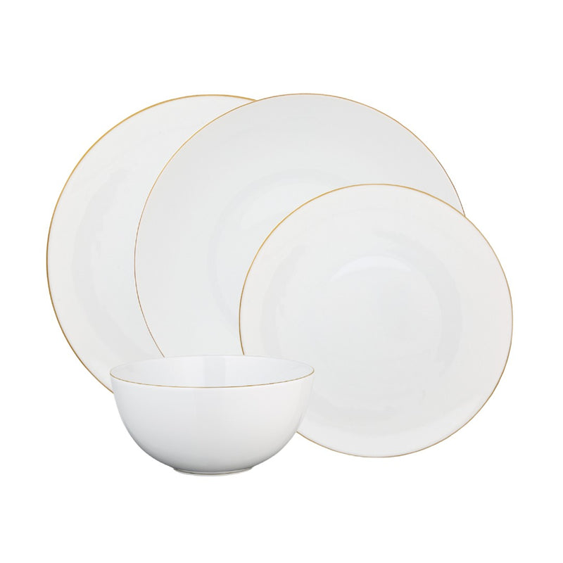 Set of white dinnerware with gold rims on a white background