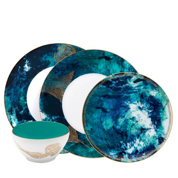 Océan Bleu Dinnerware Set of 16 by Haviland in Limoges porcelain with hand-painted blue tones inspired by waves, jellyfish, and manta rays.