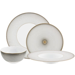 Dinnerware set of 16 pieces in Limoges porcelain with black and gold Bauhaus-inspired motifs from the Oskar collection by Raynaud.