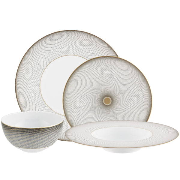 Dinnerware set of 16 pieces in Limoges porcelain with black and gold Bauhaus-inspired motifs from the Oskar collection by Raynaud.