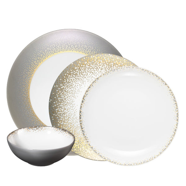 Souffle d’Or 16-piece dinnerware set by Haviland in handmade Limoges porcelain, inspired by a supernova with grey and matte gold accents.