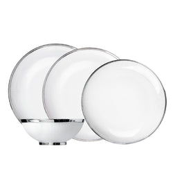 Stella Platinum 16-piece porcelain dinnerware set by SIEGER by FÜRSTENBERG, handcrafted in Germany with refined platinum detailing.