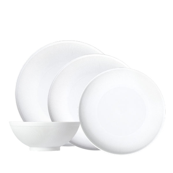 Stella Satin White 16-piece velvety matte porcelain dinnerware set by SIEGER by FÜRSTENBERG, handcrafted in Germany for luxury dining settings.