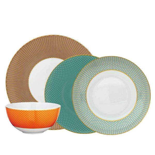Raynaud Trésor Limoges porcelain 16-piece dinnerware set with sari-inspired honeycomb motif in turquoise, orange, chestnut, and gold accents
