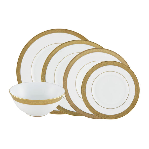 A set of white and gold porcelain dinnerware, including dinner plates, dessert plates, soup bowls, and bread plates, displayed with a golden border design.