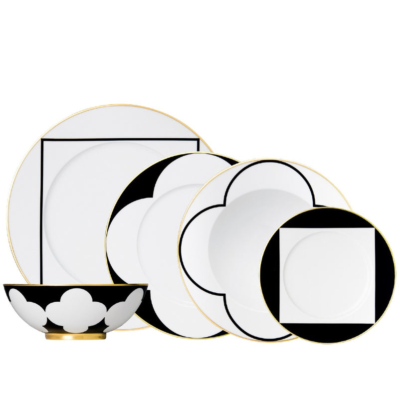 Thirty piece porcelain dinnerware set from my china ca d oro collection in black white and gold by sieger furstenberg