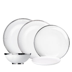 Stella Platinum 30-piece porcelain dinnerware set by SIEGER by FÜRSTENBERG, handcrafted in Germany with elegant platinum detailing.

