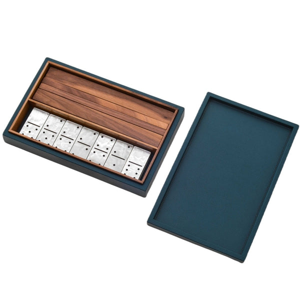 Luxury dominoes game set in petrol blue grained leather with pearl resin domino pieces and walnut trays by Pinetti