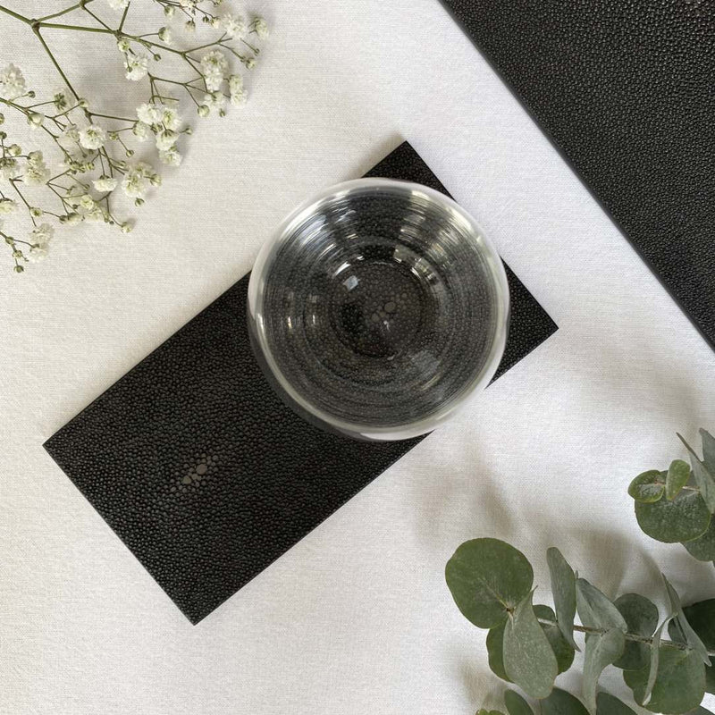 Clear glass on a Double Faux Shagreen coaster in chocolate by Posh Trading Company, luxury stingray-textured base