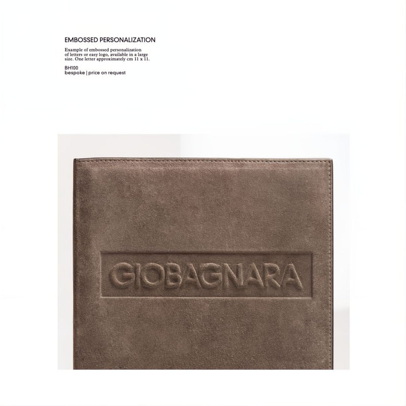 Brown leather product with 'GIOBAGNARA' embossed on it, on a white background.