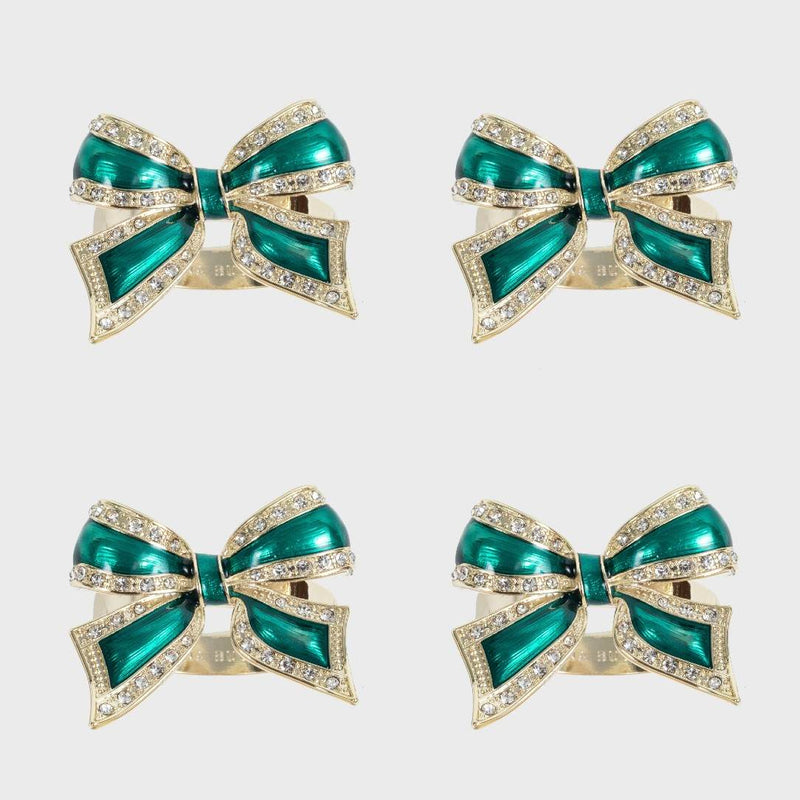 Green enamel bow napkin ring with crystal detailing by Joanna Buchanan, set of 4 on a white background