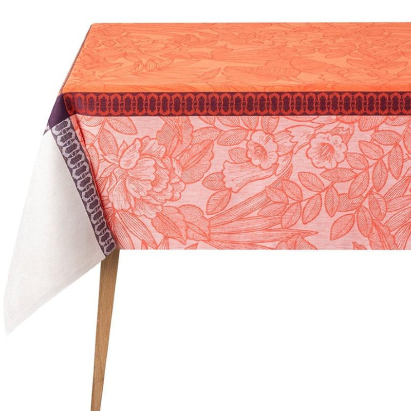 Coral floral tablecloth with a decorative border on a white background